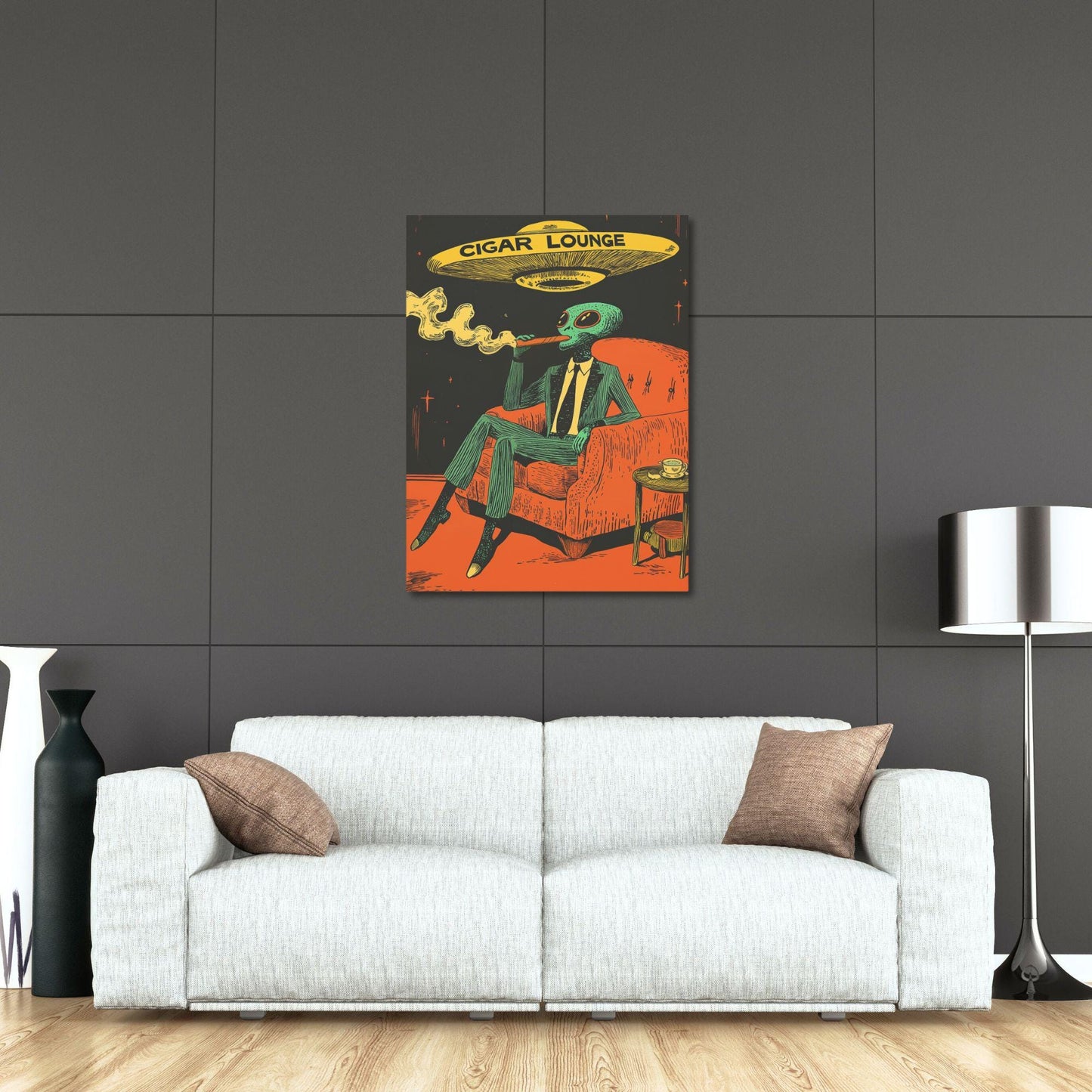 An alien smoking a cigar with a UFO above him. It says Cigar Lounge on the flying saucer.
